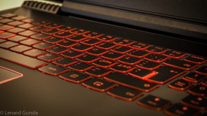 The red accents on the Y520 keyboard